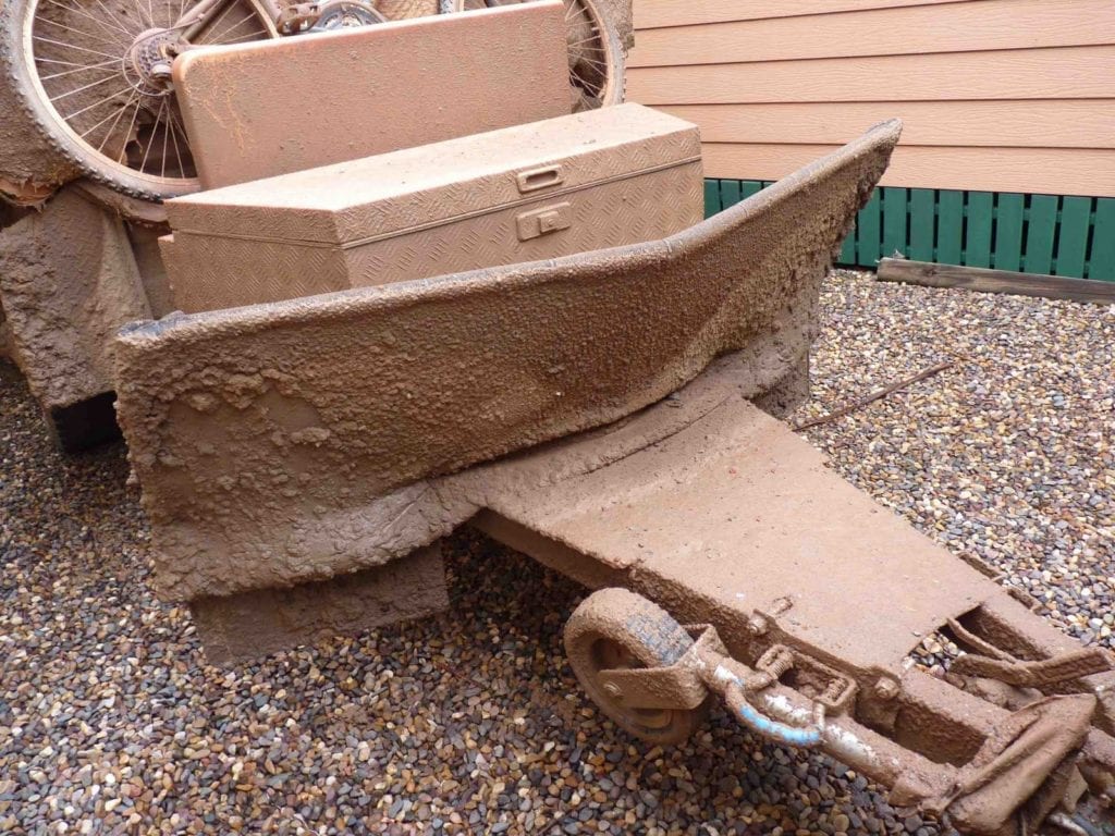 Off-Road Race Vehicle. Muddy camper trailer after an epic journey across the Gibb River Road