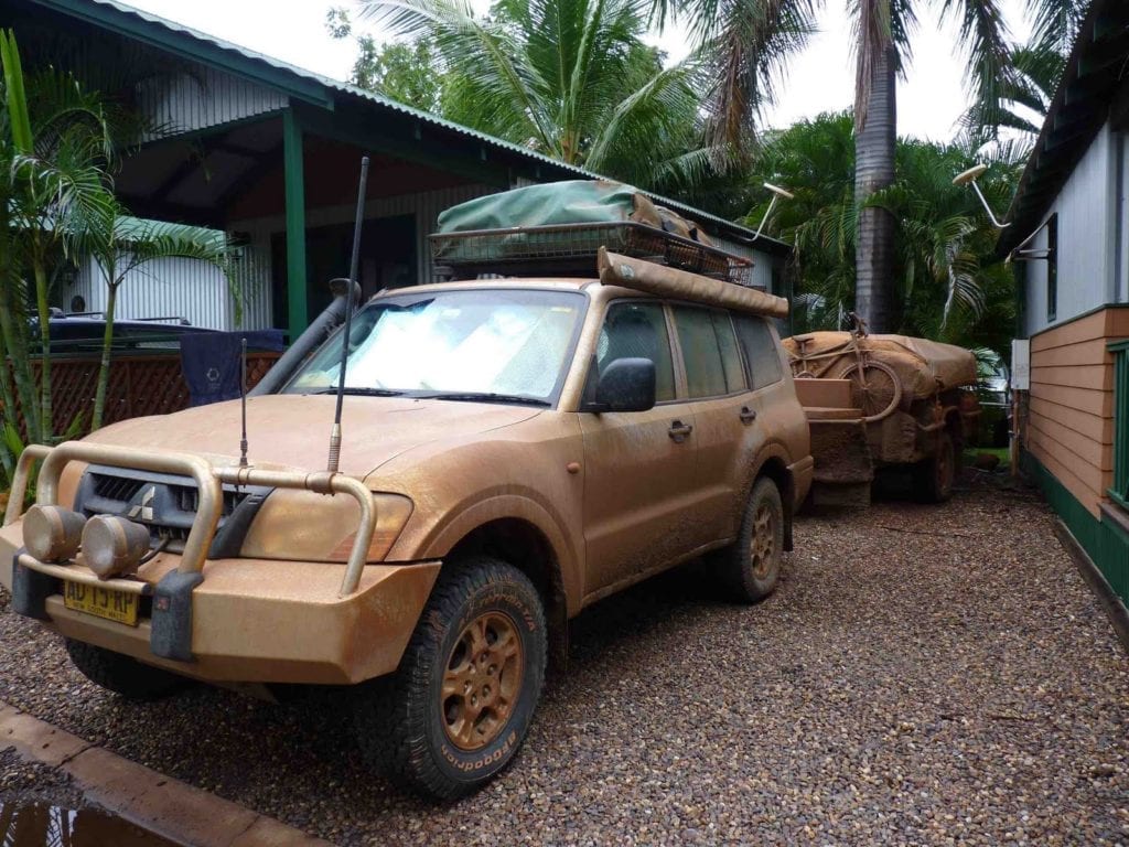 Off-Road Race Vehicle. Pajero and camper covered in thick Gibb River Road mud