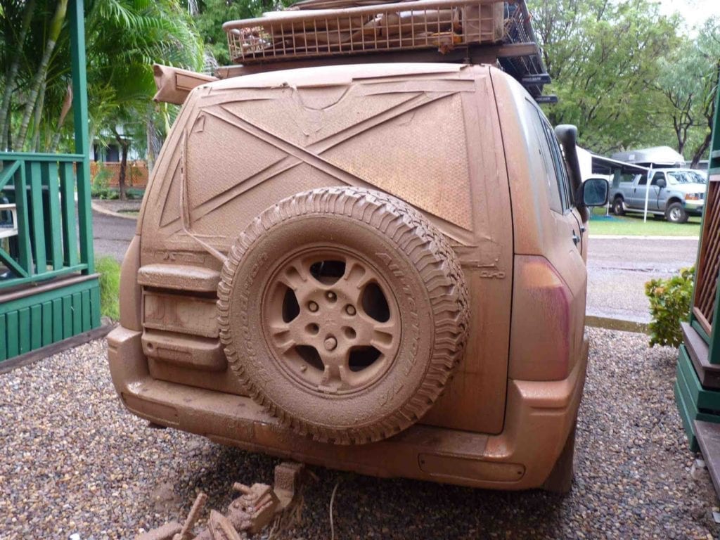 Off-Road Race Vehicle. NP Pajero covered in mud from a very wet Gibb River Road