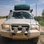 NP Pajero covered in salty muddy water on the Oodnadatta Track