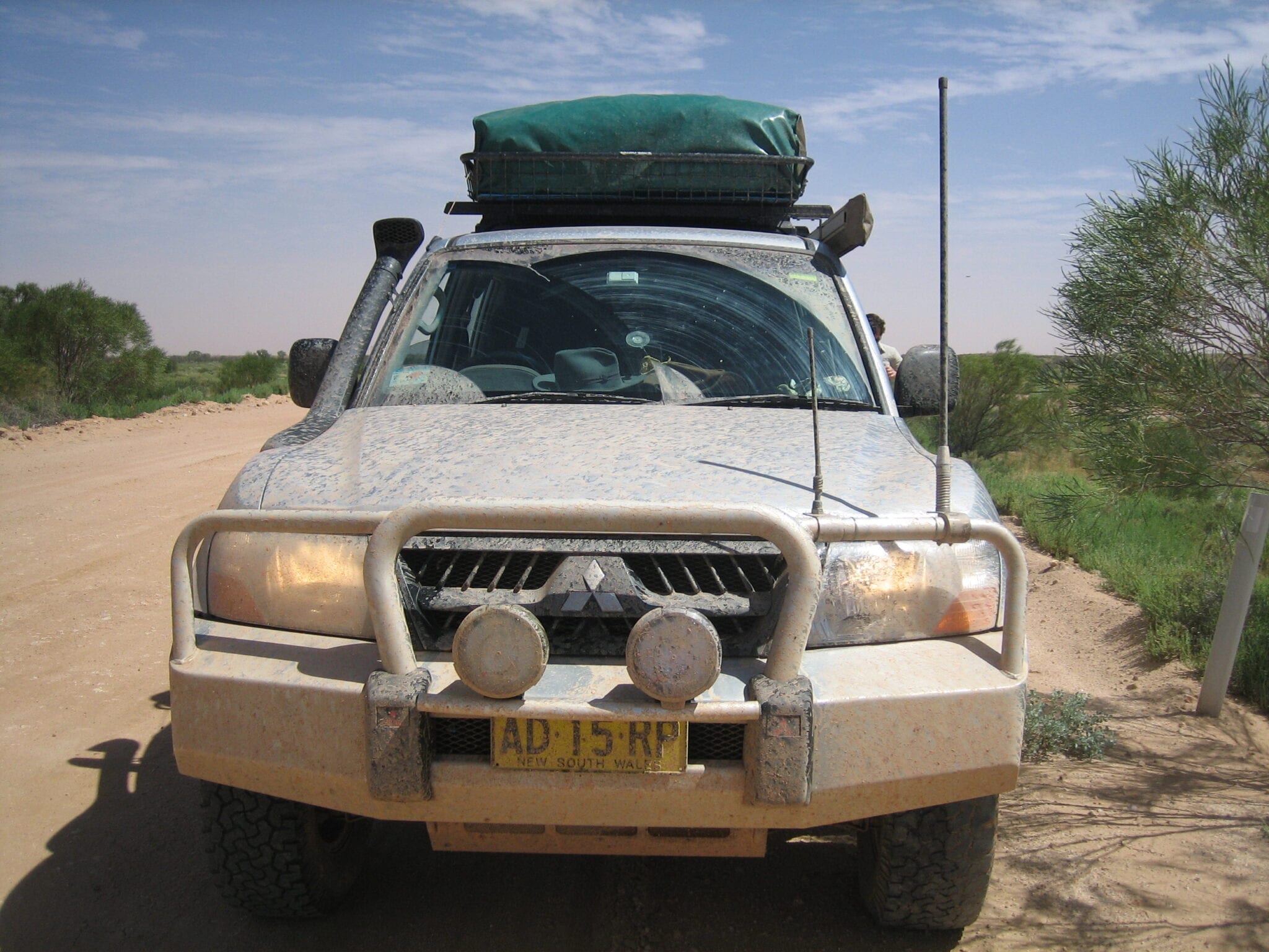 NP Pajero covered in salty muddy water on the Oodnadatta Track