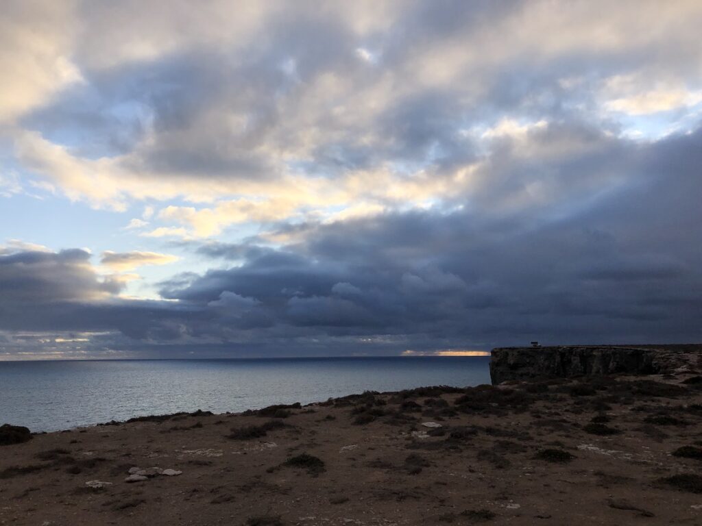 Rain clouds over the ocean, Bunda Cliffs, Nullarbor Plain SA.