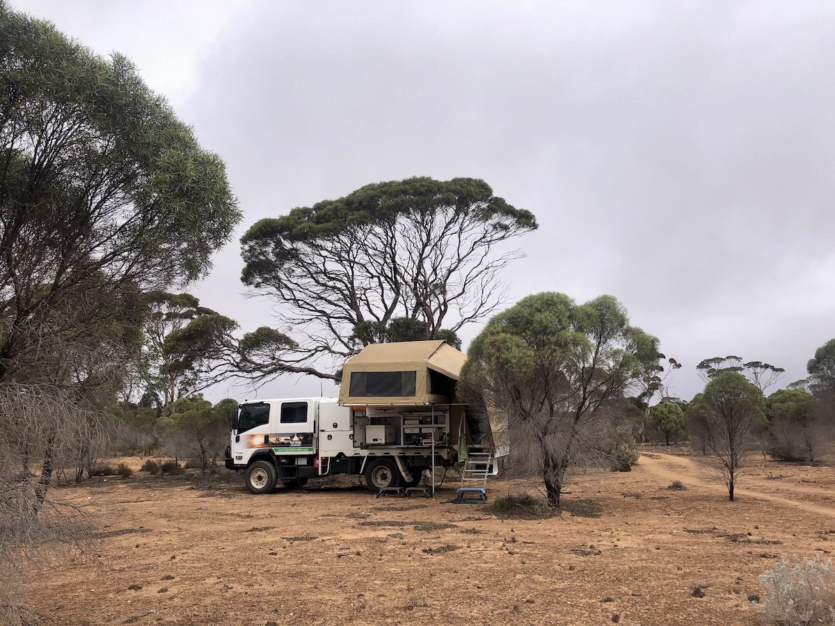 Our truck camper set up camping on the 90 Mile Straight between Balladonia and Caiguna, Nullarbor Plain.