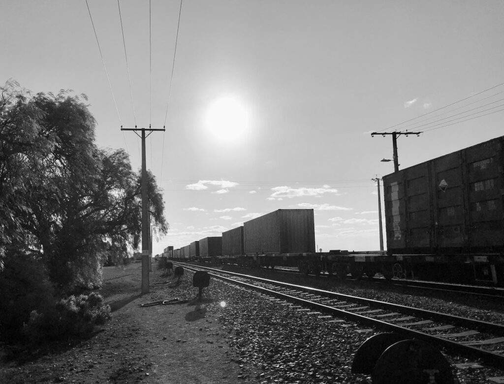 Freight train on the Trans-Australian Railway at Cook, SA. Unusual travel destuinations.