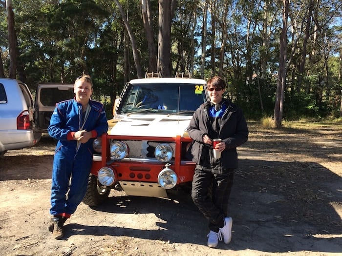 David Glazier and Peta Murray in front of Dave's Pajero cross-country race car