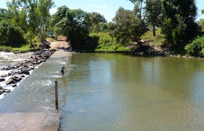 Saltwater Crocodiles- Fisherman taking his chances on Cahills Crossing, Kakadu NT