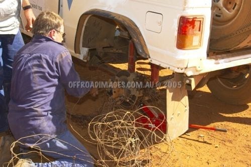 Pajero ute at Condo 750 off road event - tangled in a fence