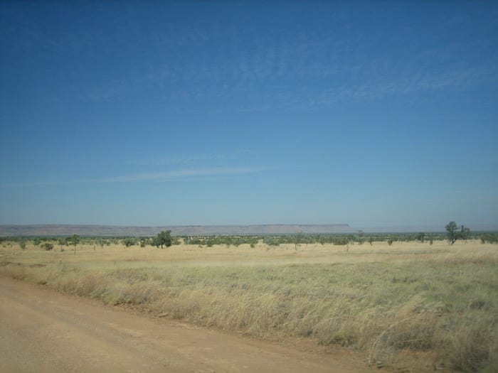 King Leopold Ranges in the distance, across the vast plains. On the road to Mornington Wilderness Camp.