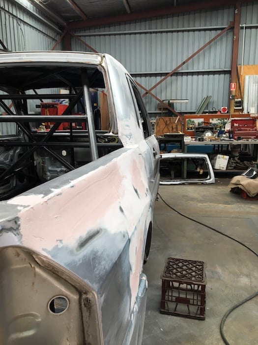 Pajero Ute Conversion. A folded sheet was welded along the top edge and blended in.