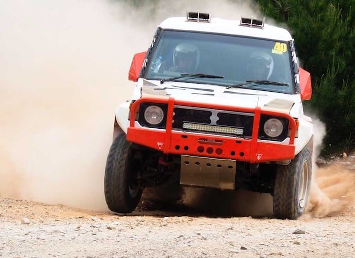 Lifting a front wheel. 80s Paint Job Retro Pajero.