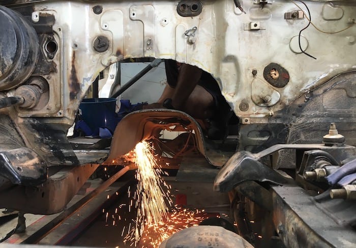 Plasma cutting the transmission tunnel. LS1 Engine Swap.