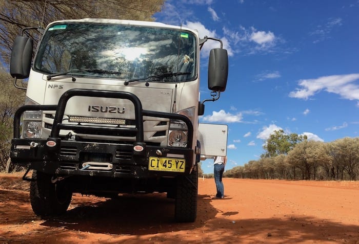 Pulled over on the upwind side of a dirt road in western NSW. Wedgetail Camper Outside Kitchen.