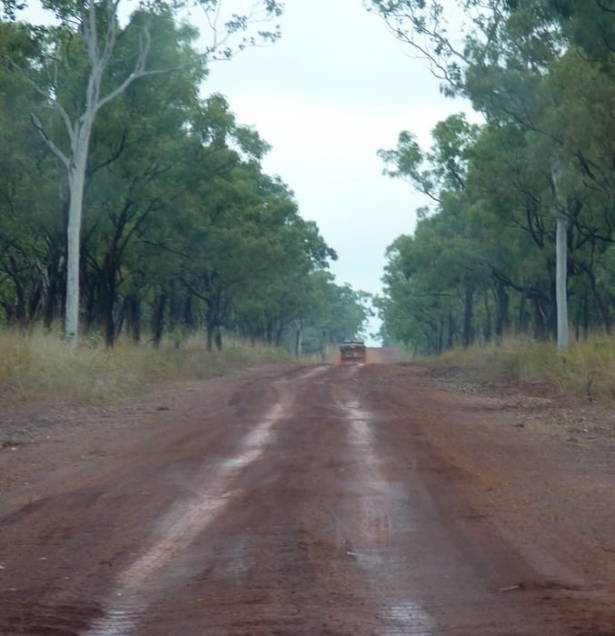 Driving out of Drysdale River Station along Kalumburu Road. Muddy Gibb River Road.