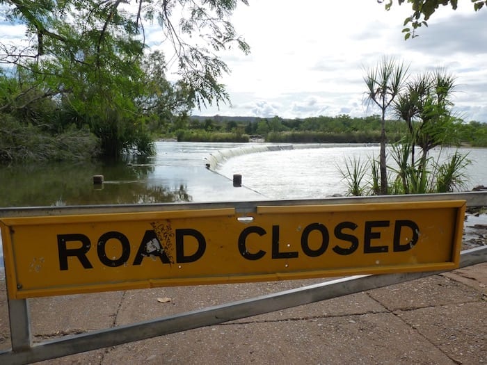 Wise words, considering the causeway was well under water. Ivanhoe Crossing near Kununurra.