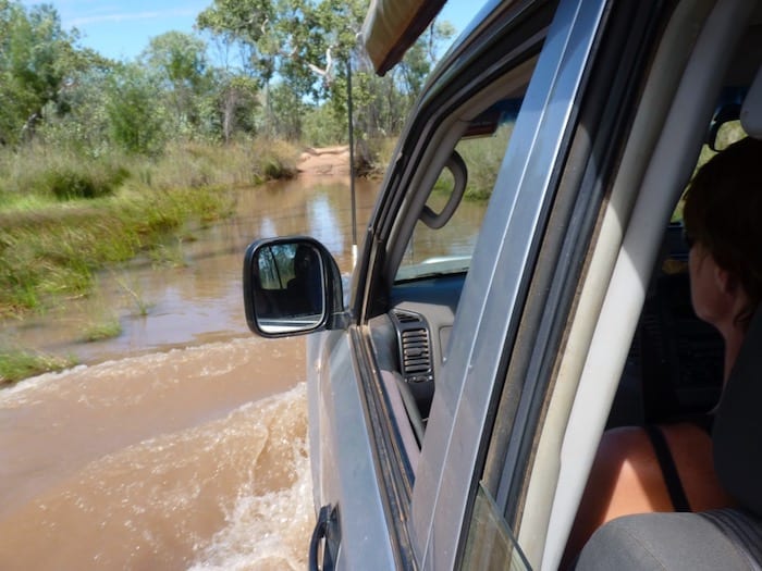 Crossing a creek on the way to Moonshine Gorge. El Questro Station Kimberleys.