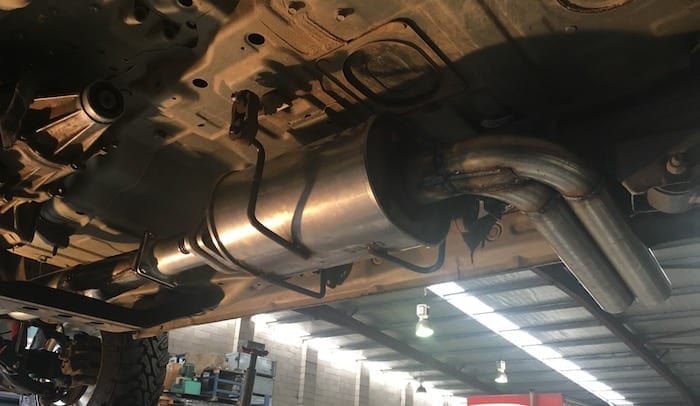 The muffler was mounted used existing parts. Pajero Exhaust System.