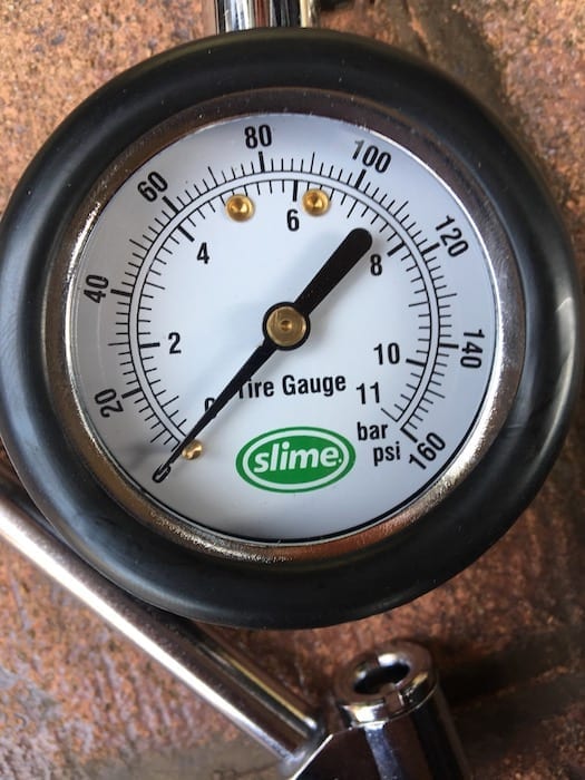 Close-up of the slime tyre pressure gauge. Gauge reads up to 160psi. Review: ARB Compressor.