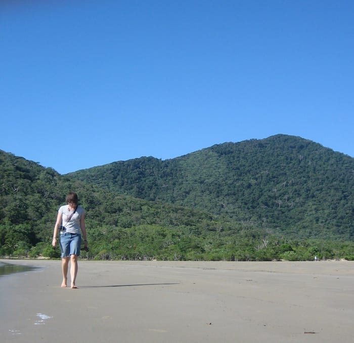 Charlie wandering along Finch's Bay beach with Mt Cook in the background. Cooktown.