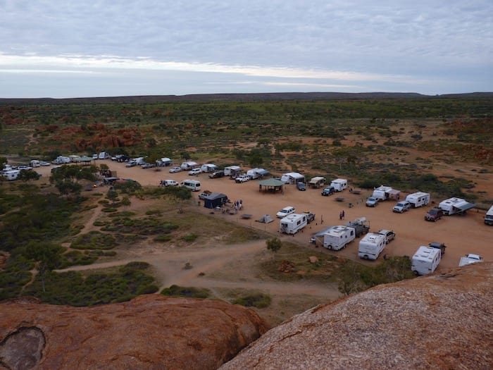 The campground filling at dusk. Devils Marbles campground.