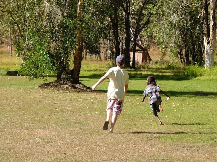 Young Desmond was about 7 years old and ran rings around Ben when they played Tip. Manyallaluk, Northern Territory.