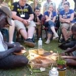 John and Desmond showing us how to paint using brushes fashioned from canegrass leaves and ochre collected from the surrounding countryside. Is harder than it looks. Was fascinating watching the quiet interaction between John and Desmond; very much the old dog and the young pup. Desmond's respect for John was very evident. Manyallaluk, Northern Territory.