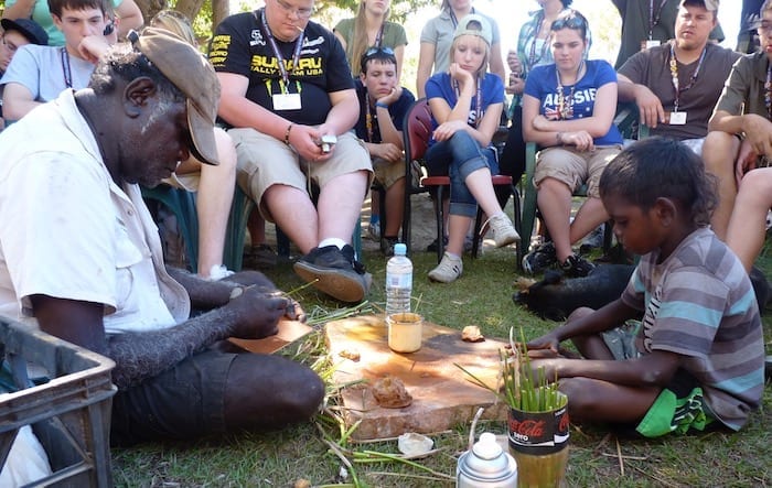 John and Desmond showing us how to paint using brushes fashioned from canegrass leaves and ochre collected from the surrounding countryside. Is harder than it looks. Was fascinating watching the quiet interaction between John and Desmond; very much the old dog and the young pup. Desmond's respect for John was very evident. Manyallaluk, Northern Territory.