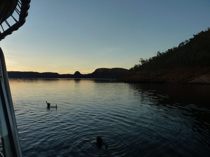 Floating on the lake at sunset. Lake Argyle Cruises.