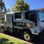 Isuzu NPS after Vinyl Wrap.