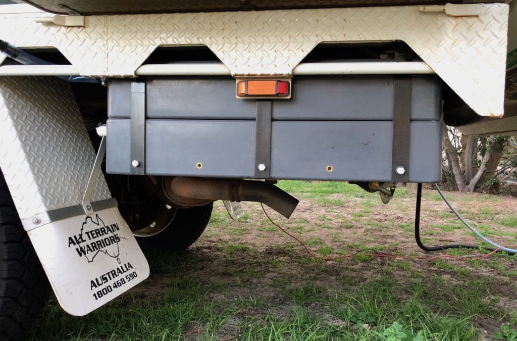 Our poly water tanks are tucked in behind the rear wheels.