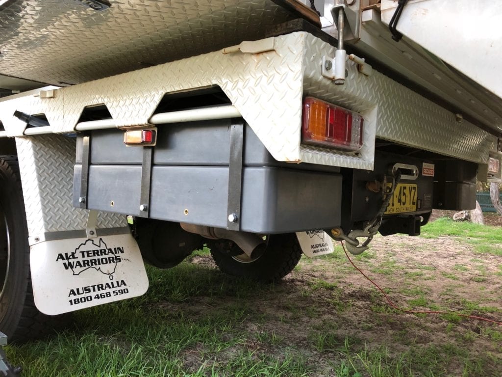 The poly water tanks fit neatly behind the rear wheels.