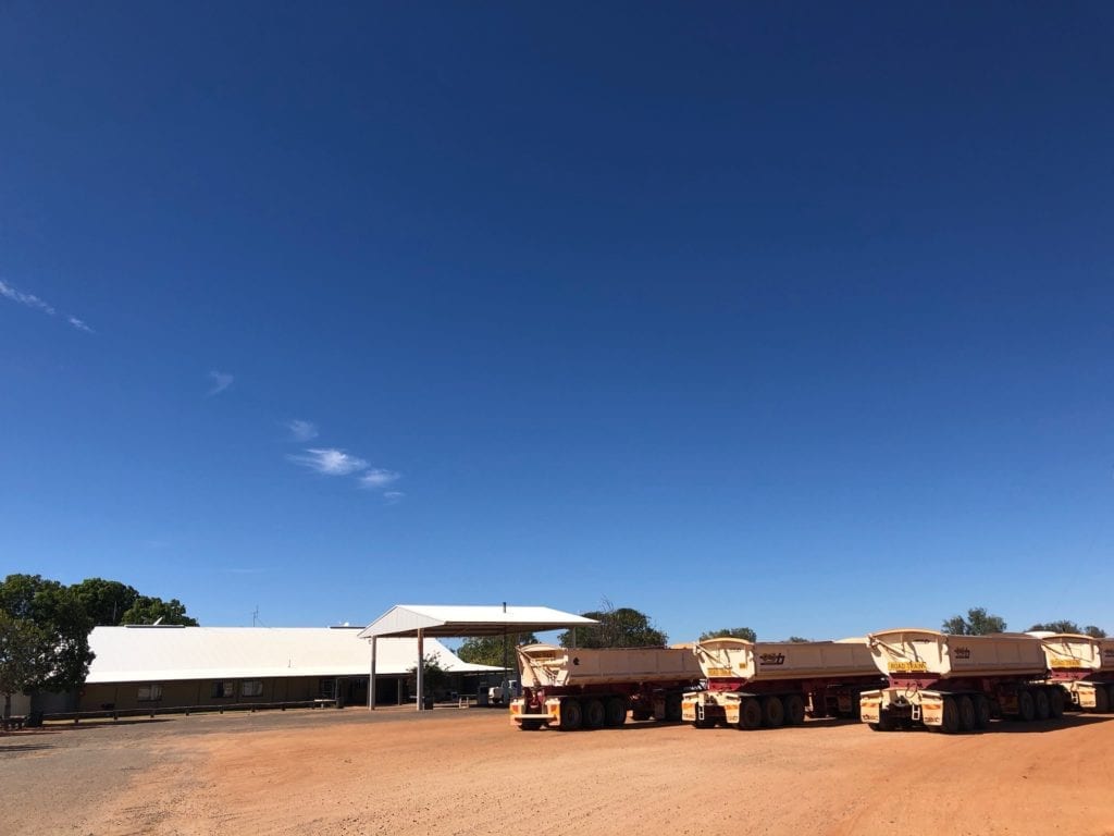 Roadatrains lined up outside Tilmouth Well Roadhouse, Tanami Road.