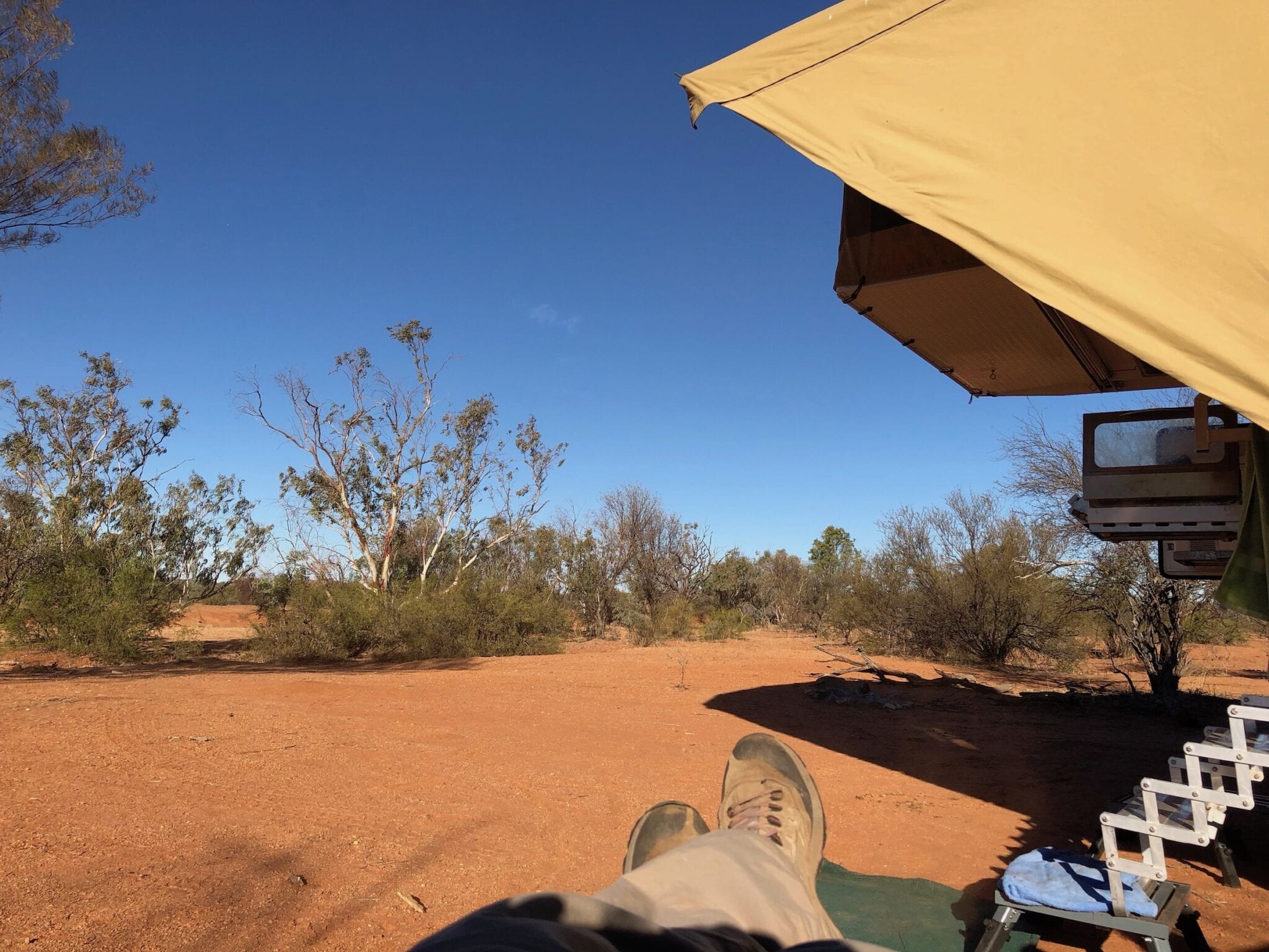 Relaxing at our bush camp near Mt Doreen ruins, Tanami Road.