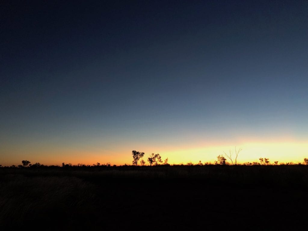 Sunset about 20km into WA on the Tanami Road.