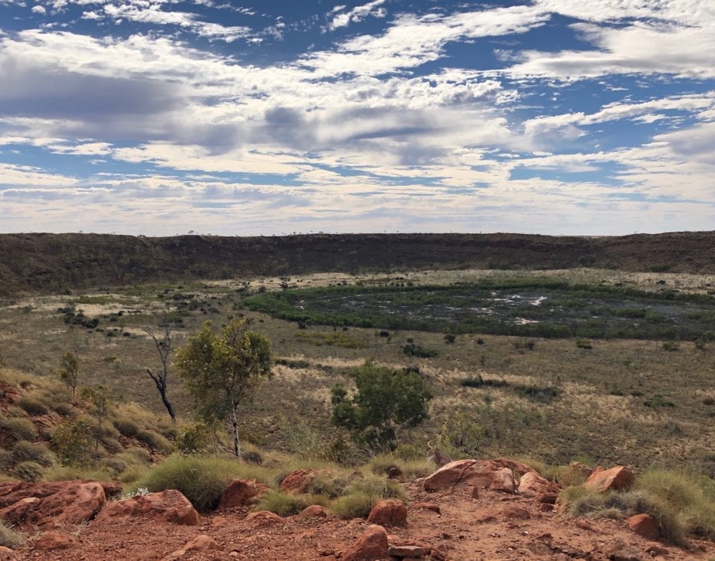 The greenery in the salt pan was unexpected. Wolfe Creek Meteorite Crater.