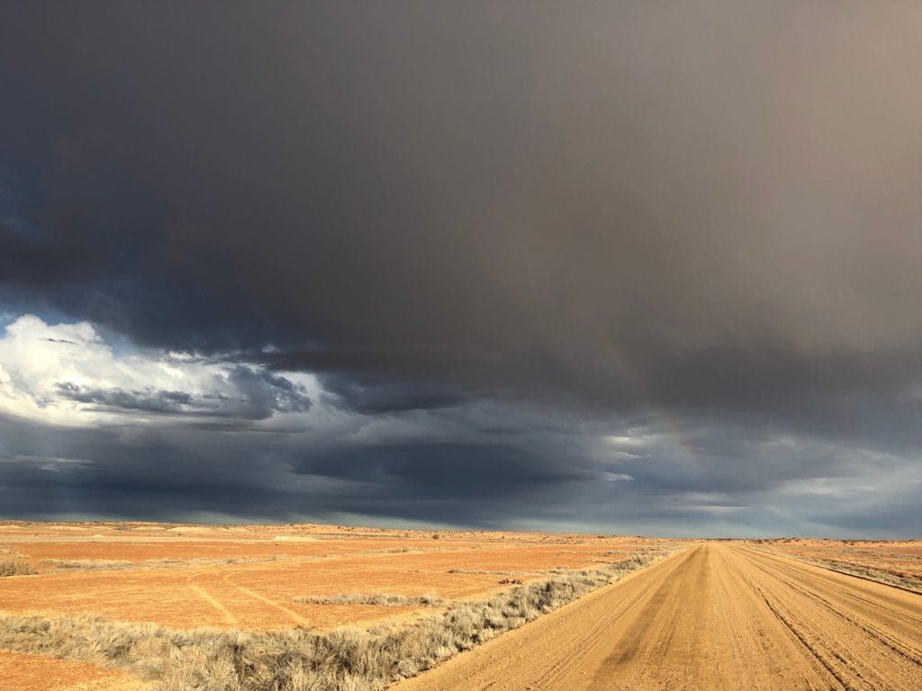 Arid country under a threatening sky. South of William Creek. Salt Lakes and Water