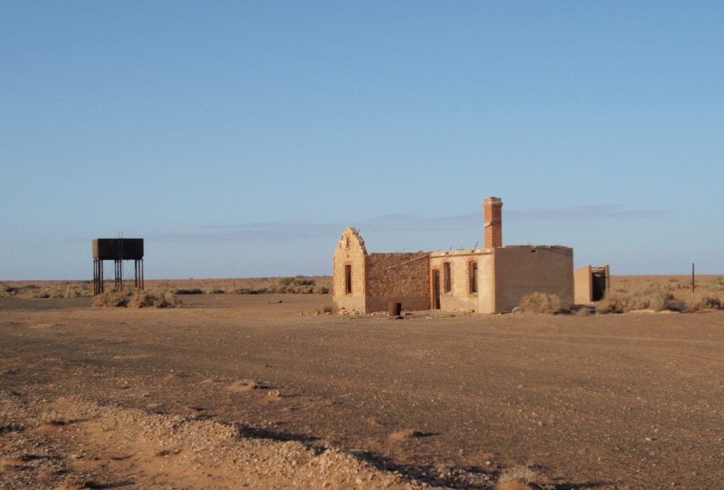 Old rail building and water tower at Farina, between Quorn SA and Marree.