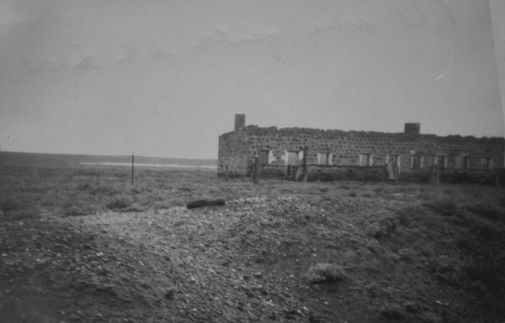 An abandoned rail building between Marree and Oodnadatta. Taken from the Old Ghan in 1950. Salt Lakes and Water.