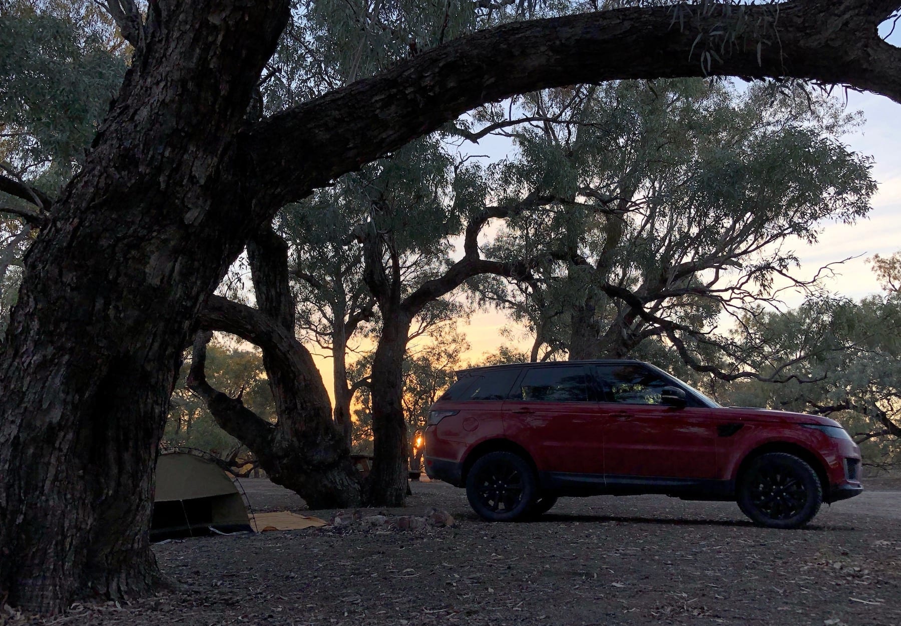 Range Rover Sport and swag at sunset on the Darling River.