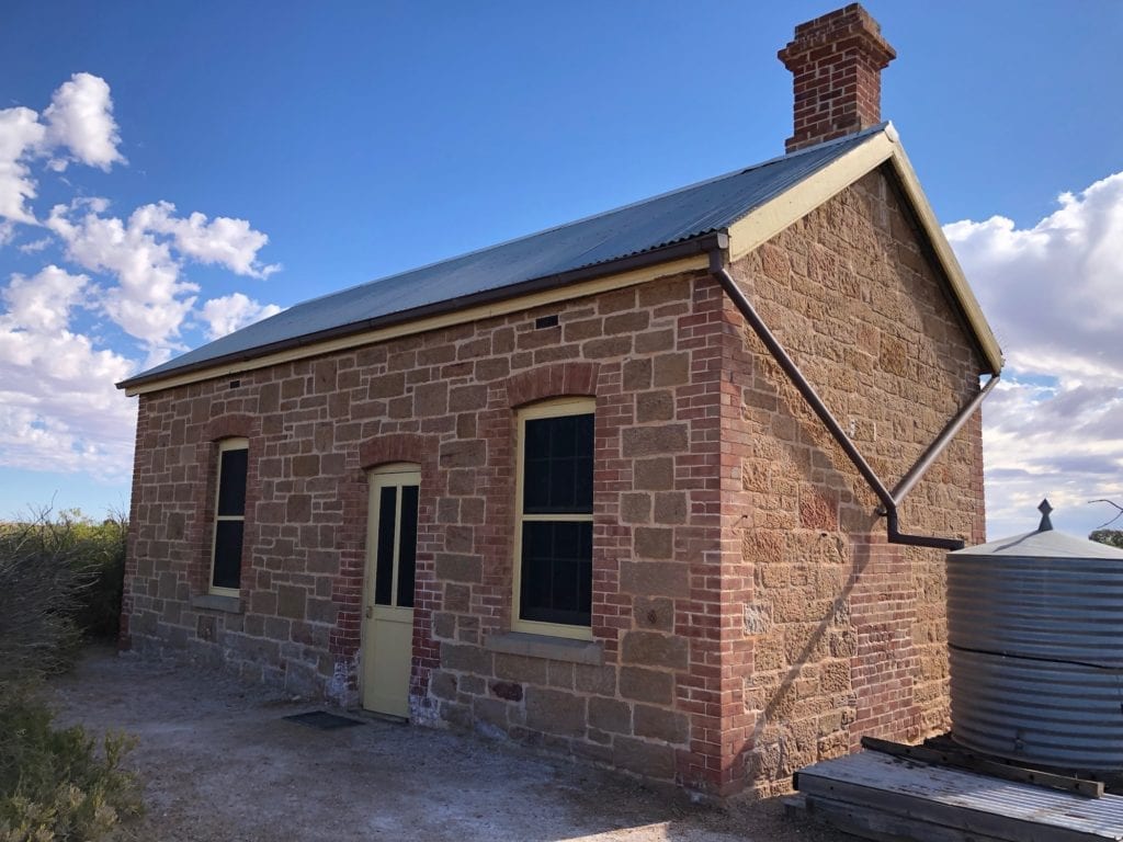 The Driver's Cottage at Coward Springs was a crumbling ruin, now an immaculate stone building.