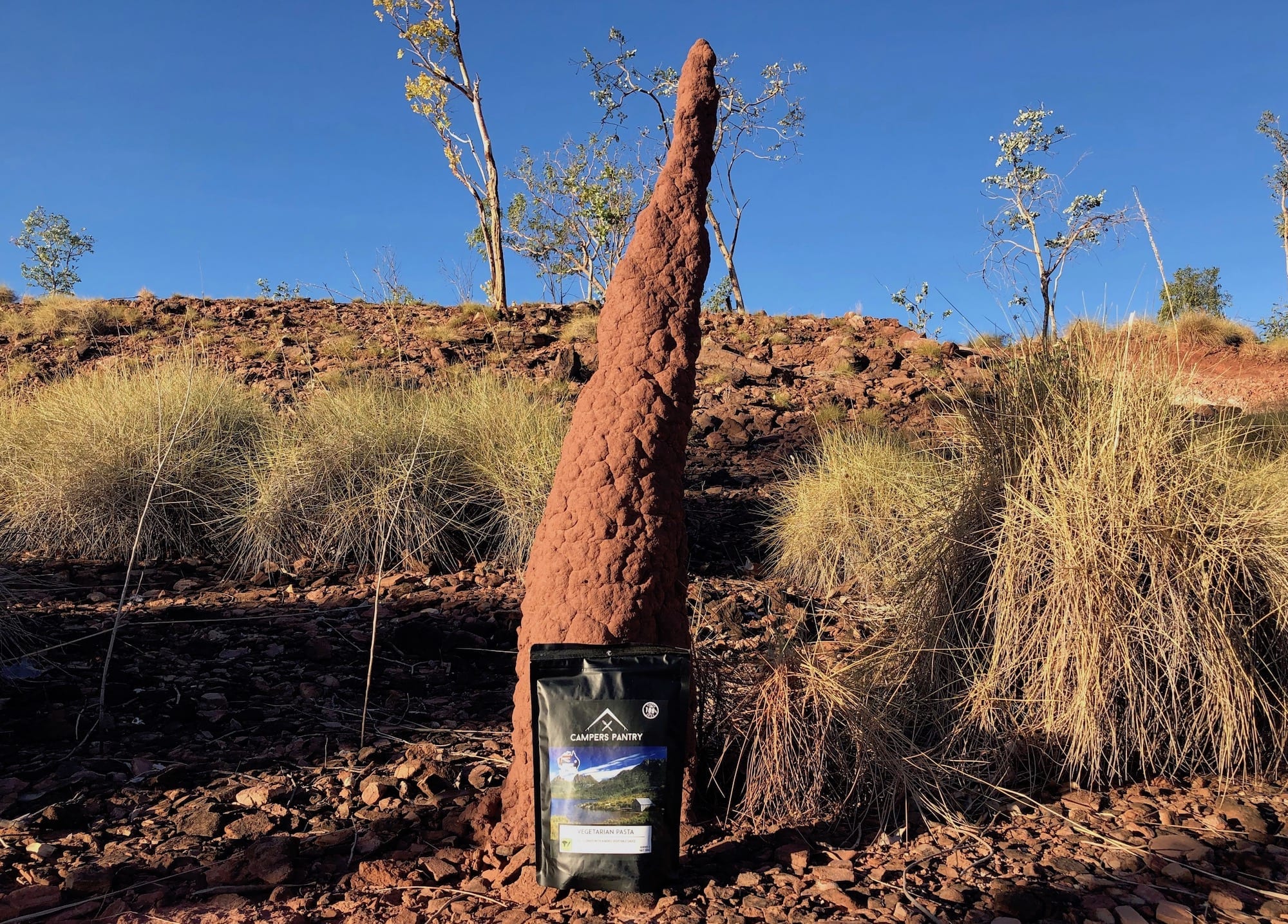 Vegetarian Pasta from Campers Pantry in front of a termite mound in Judbarra / Gragory National Park, NT.