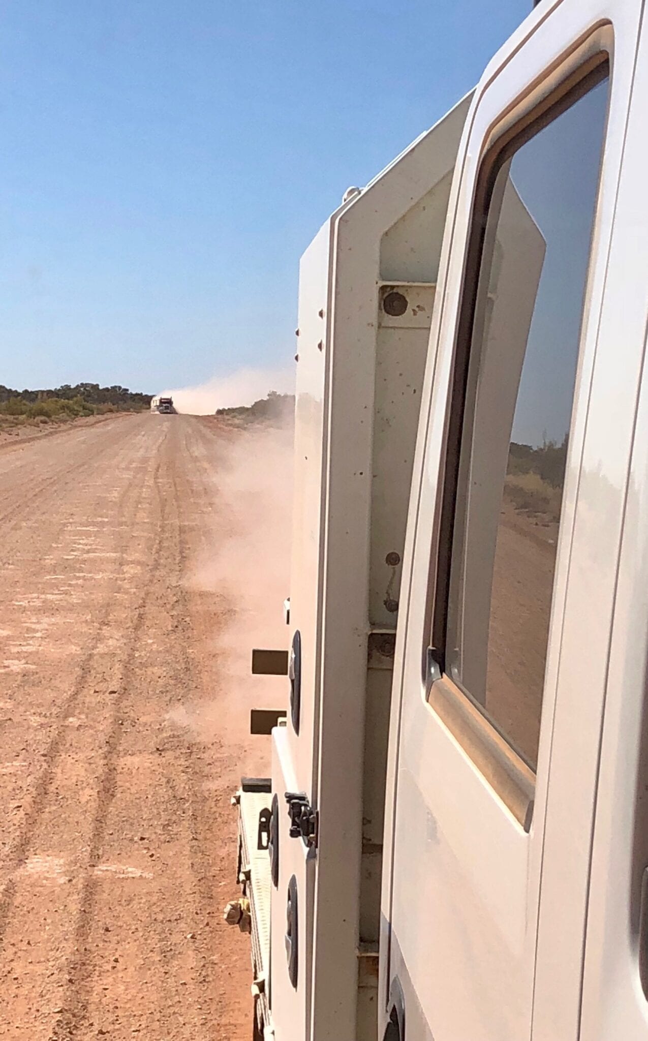 Overtaking is difficult in the thick dust. Great Central Road Condition.