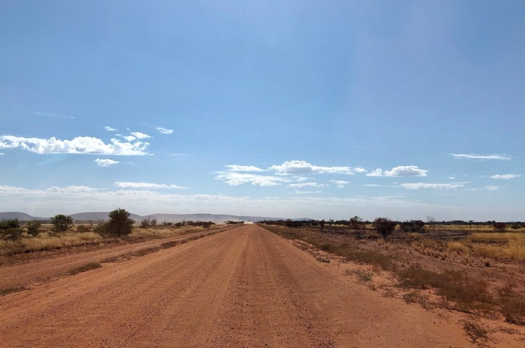 This isn't another vehicle kicking up dust. It was caused by gale force southerly winds. Great Central Road, Great Victoria Desert.