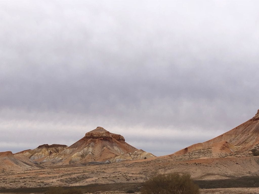 Flat-topped mesas have formed after millions of years of erosion at the Painted Desert SA.