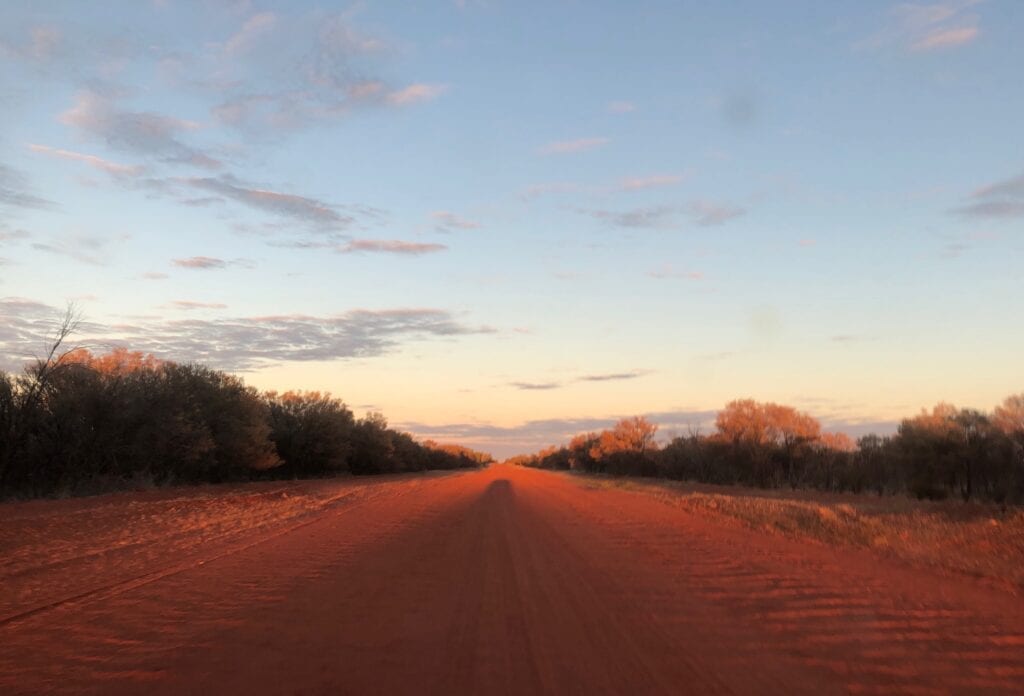 Incredible hues of red and orange as the sun rose on the Sandover Highway, NT.