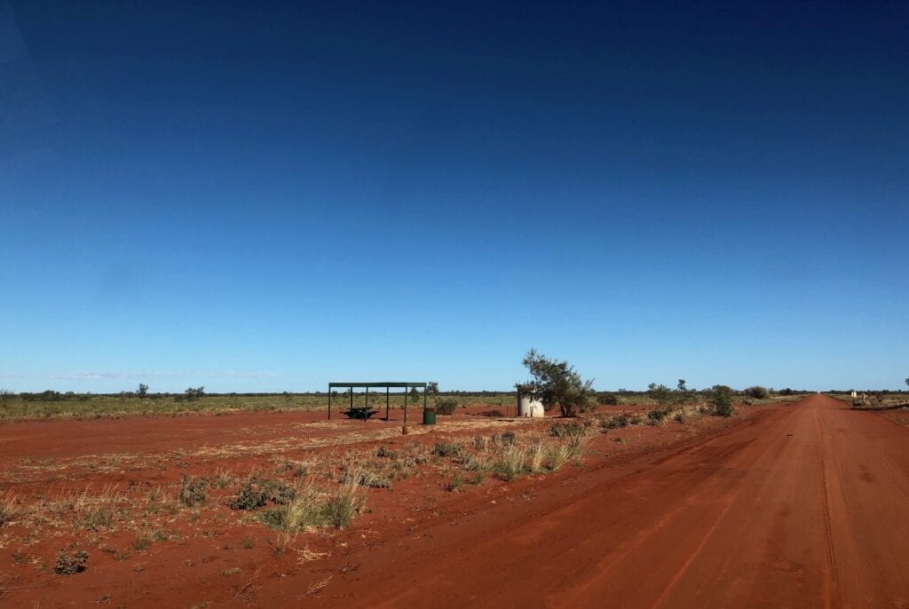 This rest area beside the Sandover Highway is west of Alpurrurulam. It's very exposed and barren.