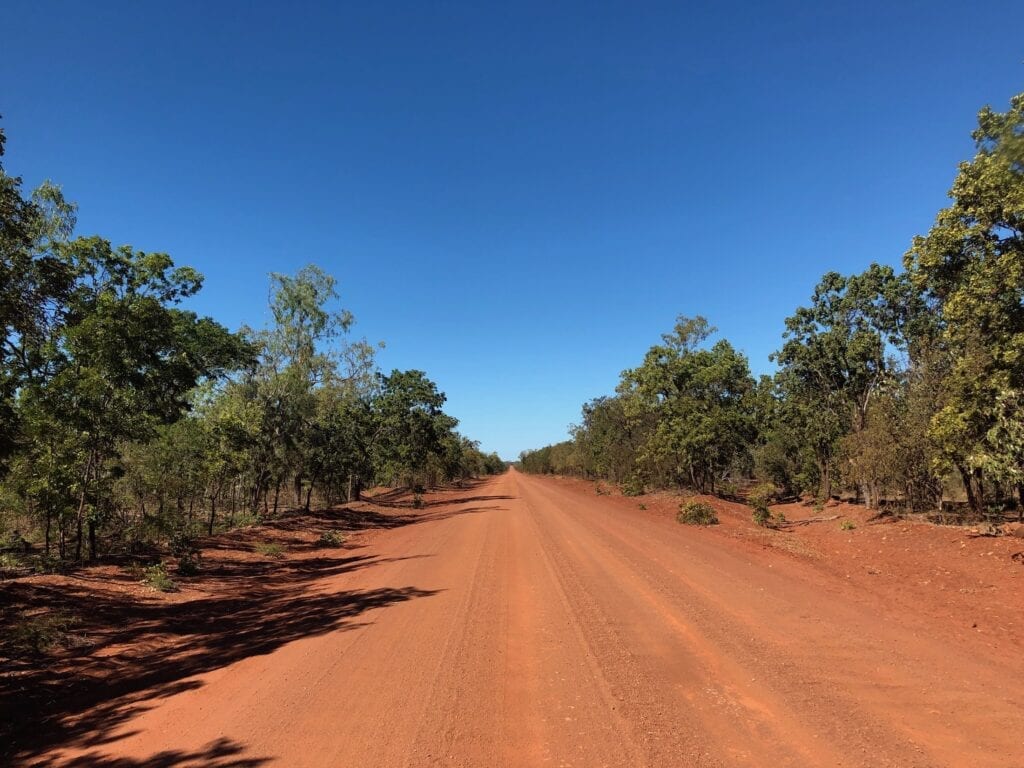 The sandy road disappears into the distance. Carpentaria Highway between Borroloola NT and Hells Gate QLD.