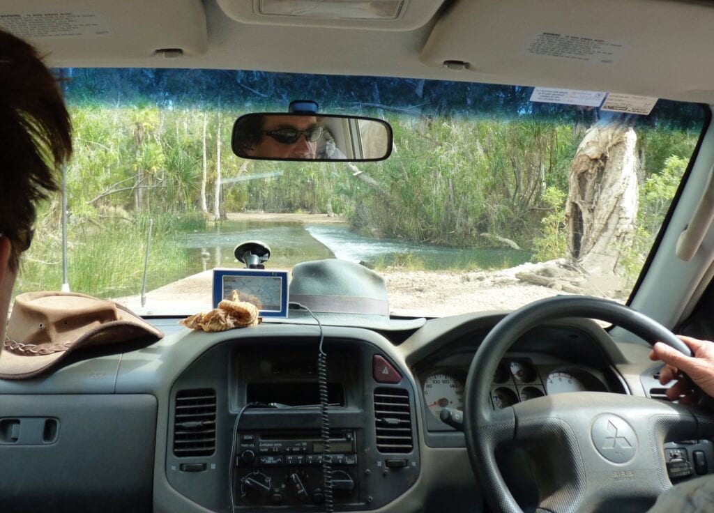 We used a Hema Navigator 4.3 for many years, mounted to the dashboard of our Pajero with a suction cup.