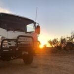 Our Isuzu NPS 4x4 truck camped beside Cooper Creek at Walkers Crossing.