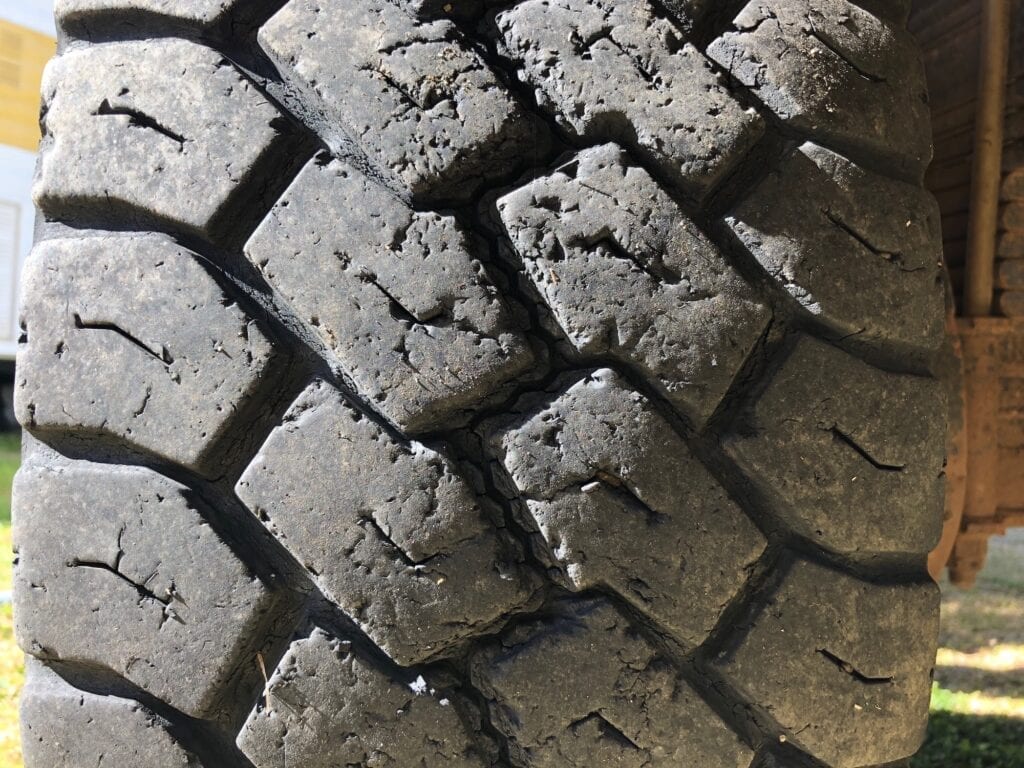 The rear tyres of our Isuzu NPS 4x4 truck cop plenty of surface damage on the tread, from jagged rocks.