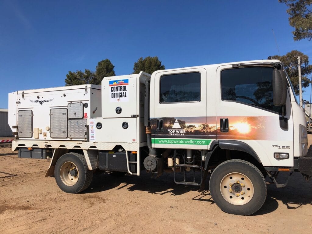 Our truck camper covered in stickers for the Sunraysia Safari.